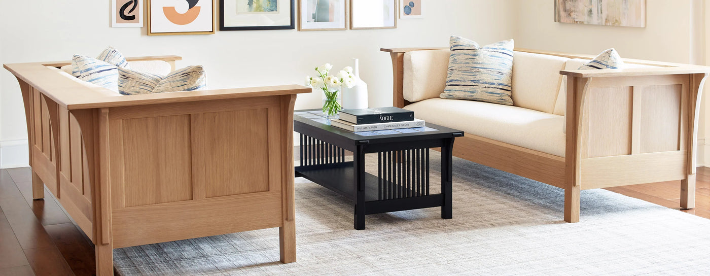 A stylish living room featuring two couches and a table, showcasing furniture available at a Philadelphia store.
